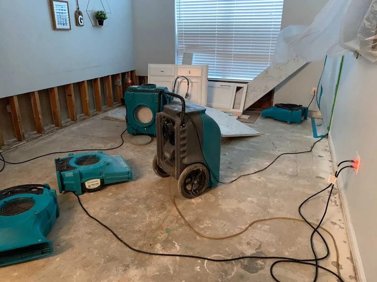 Dehumidifier in flood-cut room for Water Damage Restoration in Bel Air